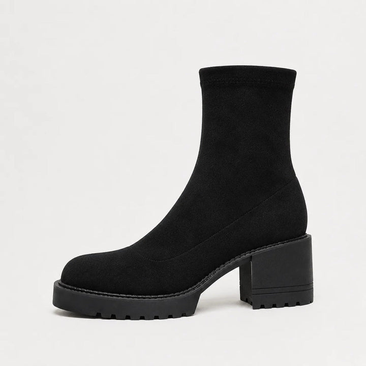 Black faux suede ankle boot with block heel and lug sole