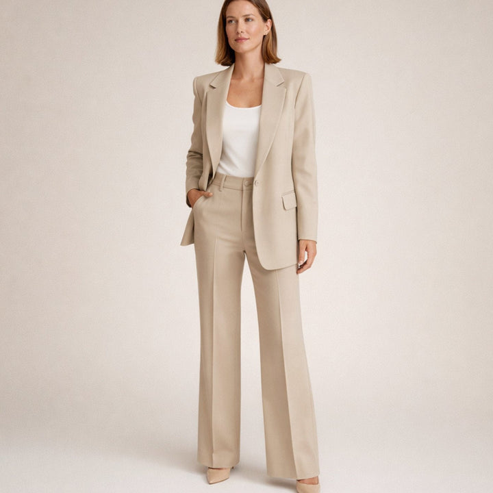 Trouser suit with single-button blazer and wide-leg trousers in beige, worn, front view