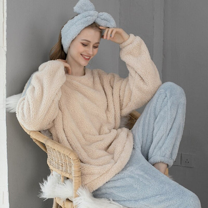 Cream and blue fleece pyjamas, sitting in a wicker chair