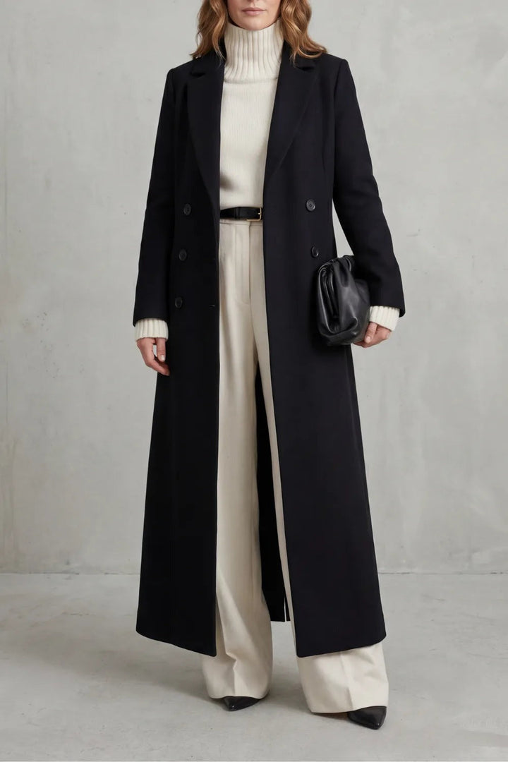 Long double-breasted wool coat in black, worn
