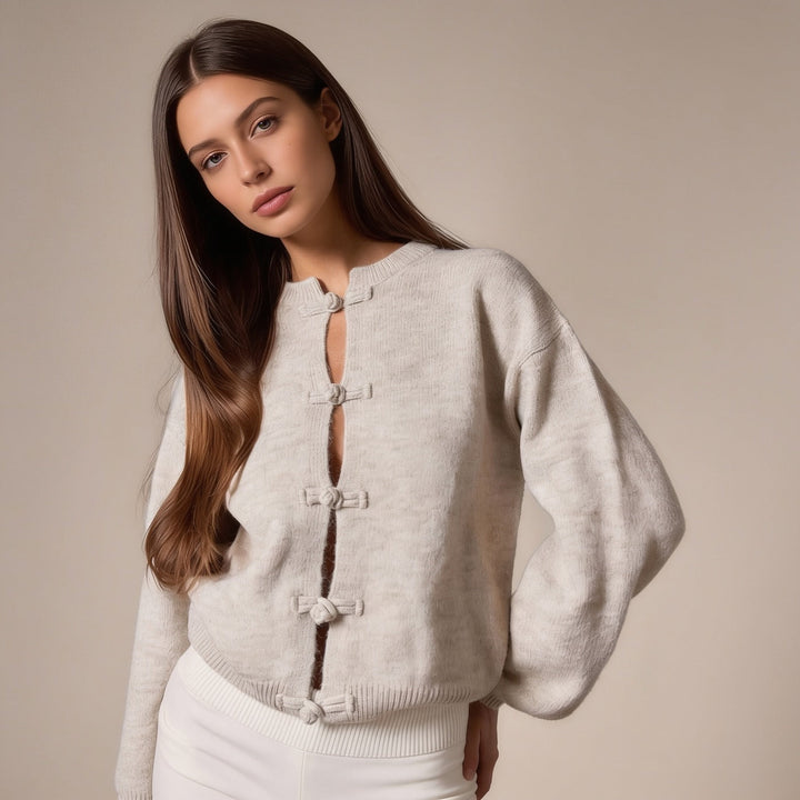 Knitted cardigan with knotted fastening in beige, worn, front view