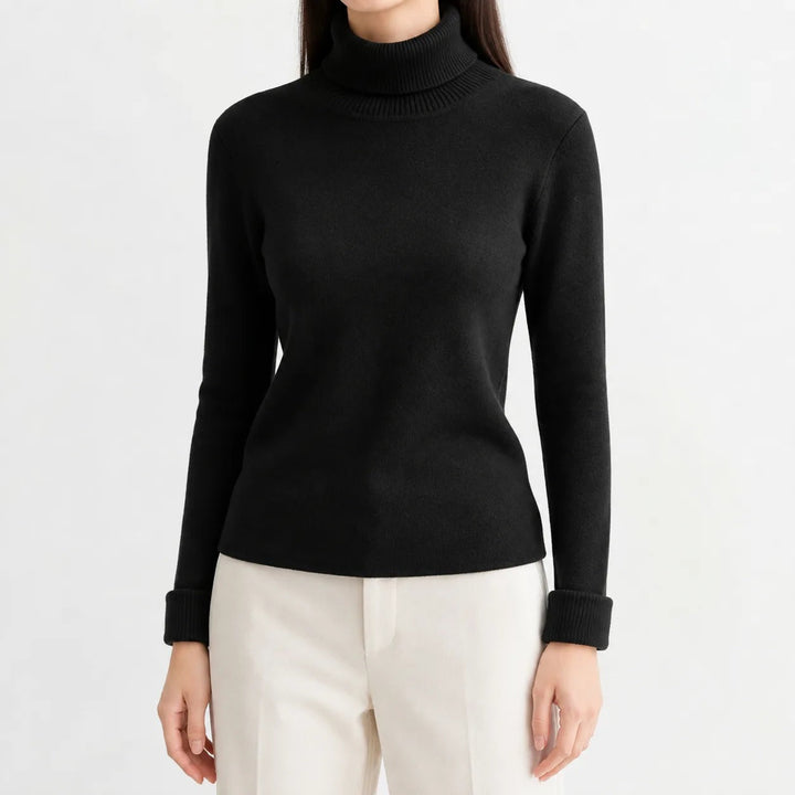 Thick-knit roll-neck jumper in black, worn, front view