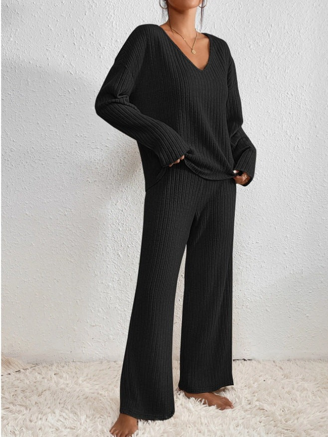 Black ribbed lounge set with V-neck jumper and wide-leg trousers