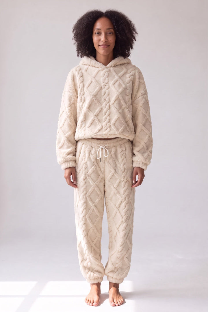 Beige textured plush hoodie and joggers lounge set, worn, front view