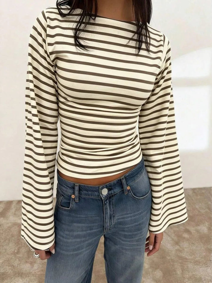 Striped boat-neck long-sleeve top in cream-brown, worn, front view