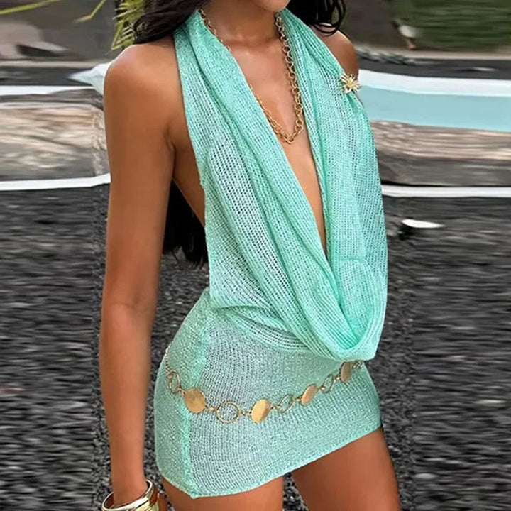 Metallic knit halterneck mini dress in mint green, worn, front view