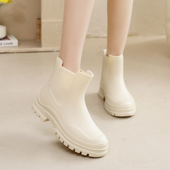 Matte Chelsea ankle boots in beige, worn
