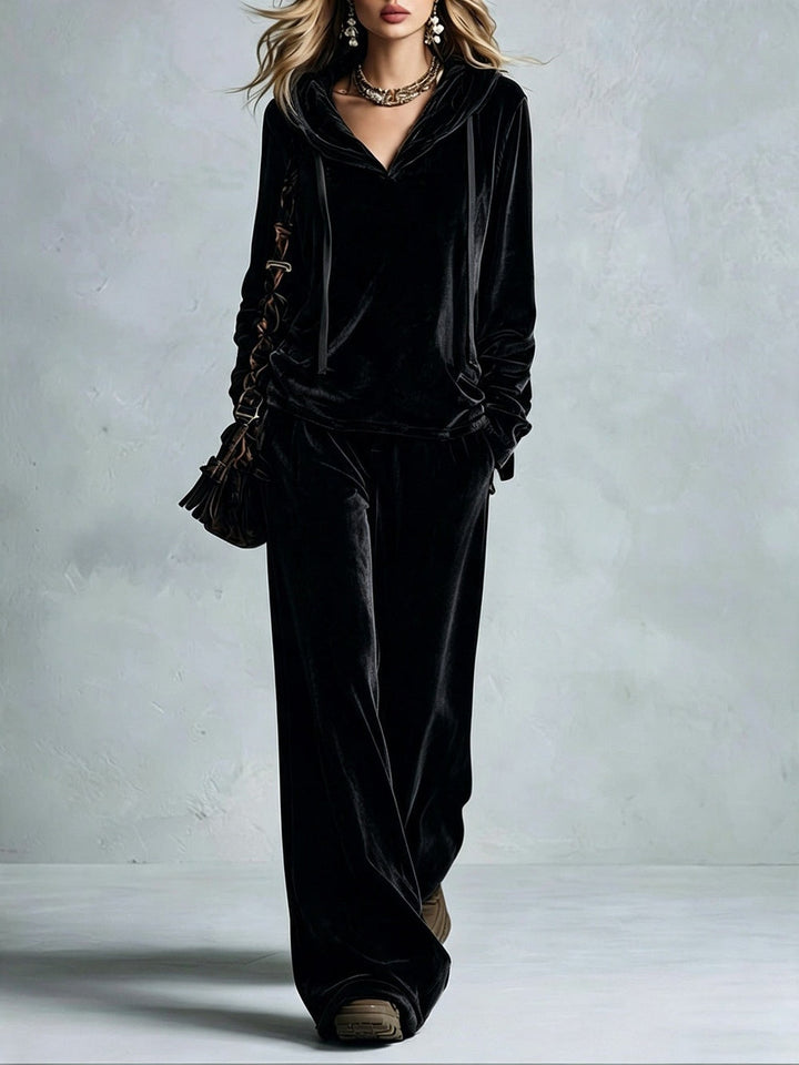 Black velvet lounge set with V-neck hoodie and wide-leg trousers, full-length front view