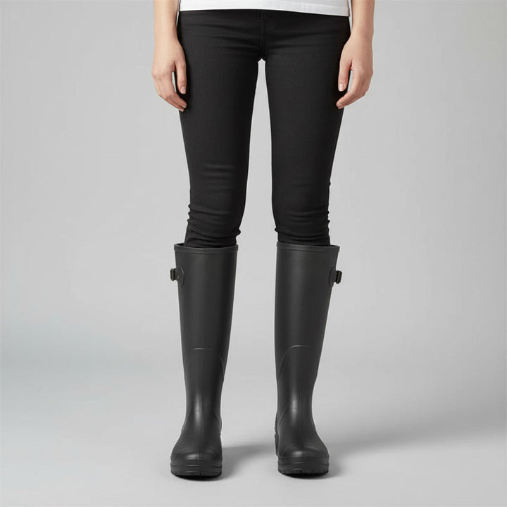 Knee-high matte wellies in black, worn