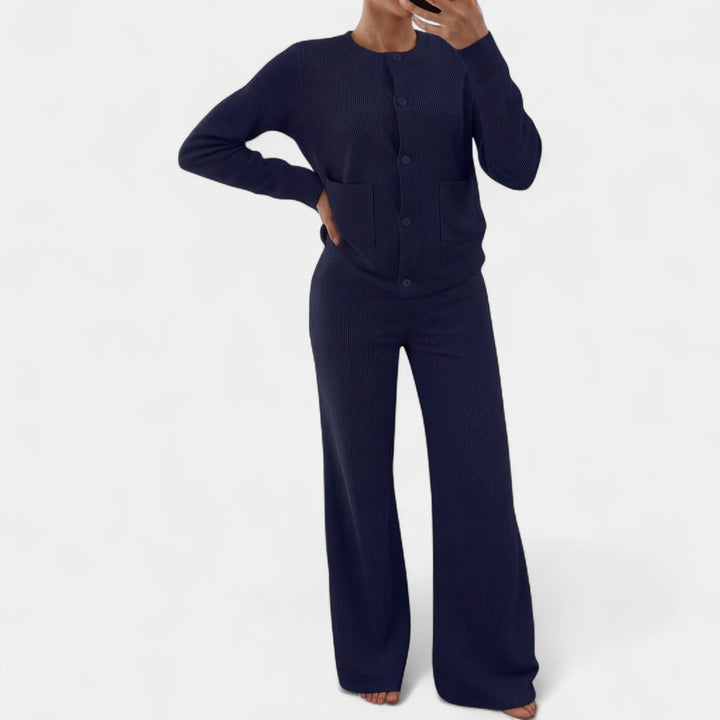 Navy ribbed knit cardigan with patch pockets and wide-leg trousers, front view