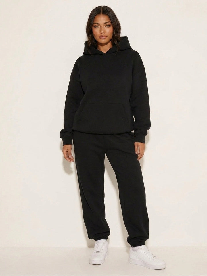 Black oversized tracksuit, front view