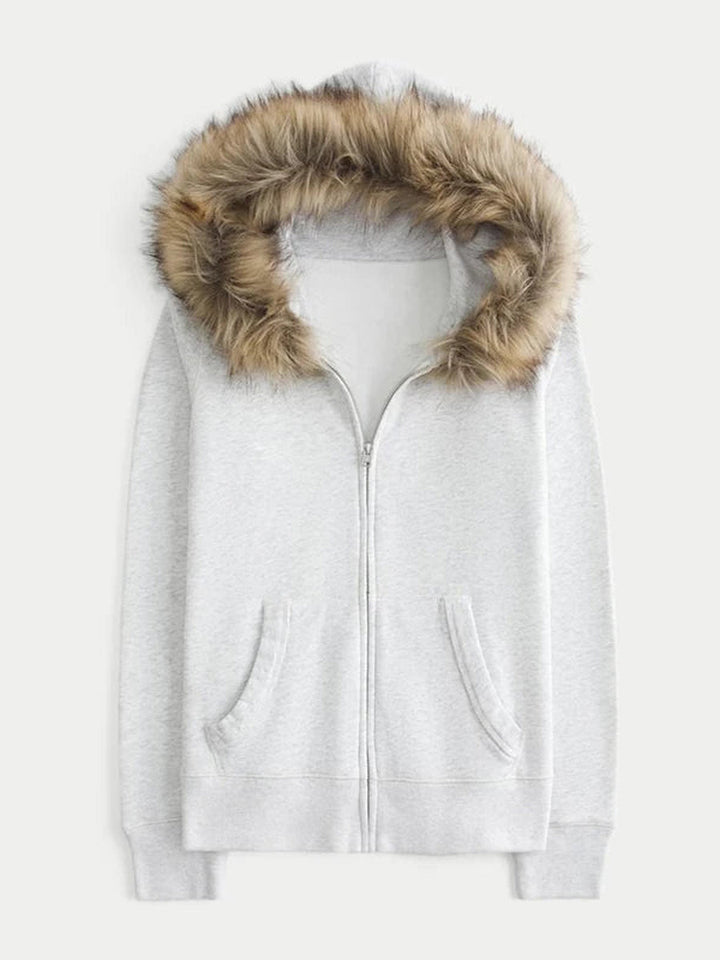 Light grey zip-up hoodie laid flat, showing the faux fur trim, zip and two pockets | Grace Aura