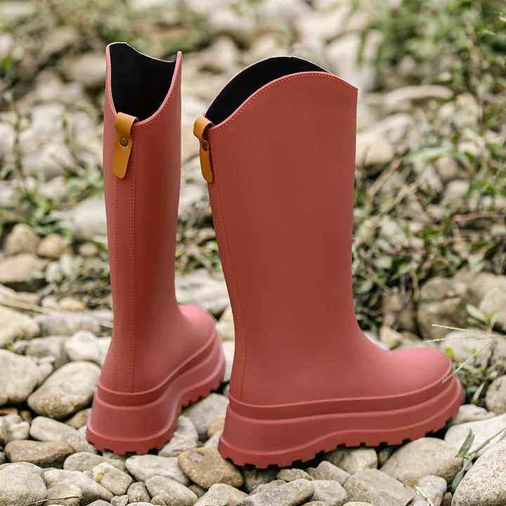 Knee-high matte wellies in red, back view