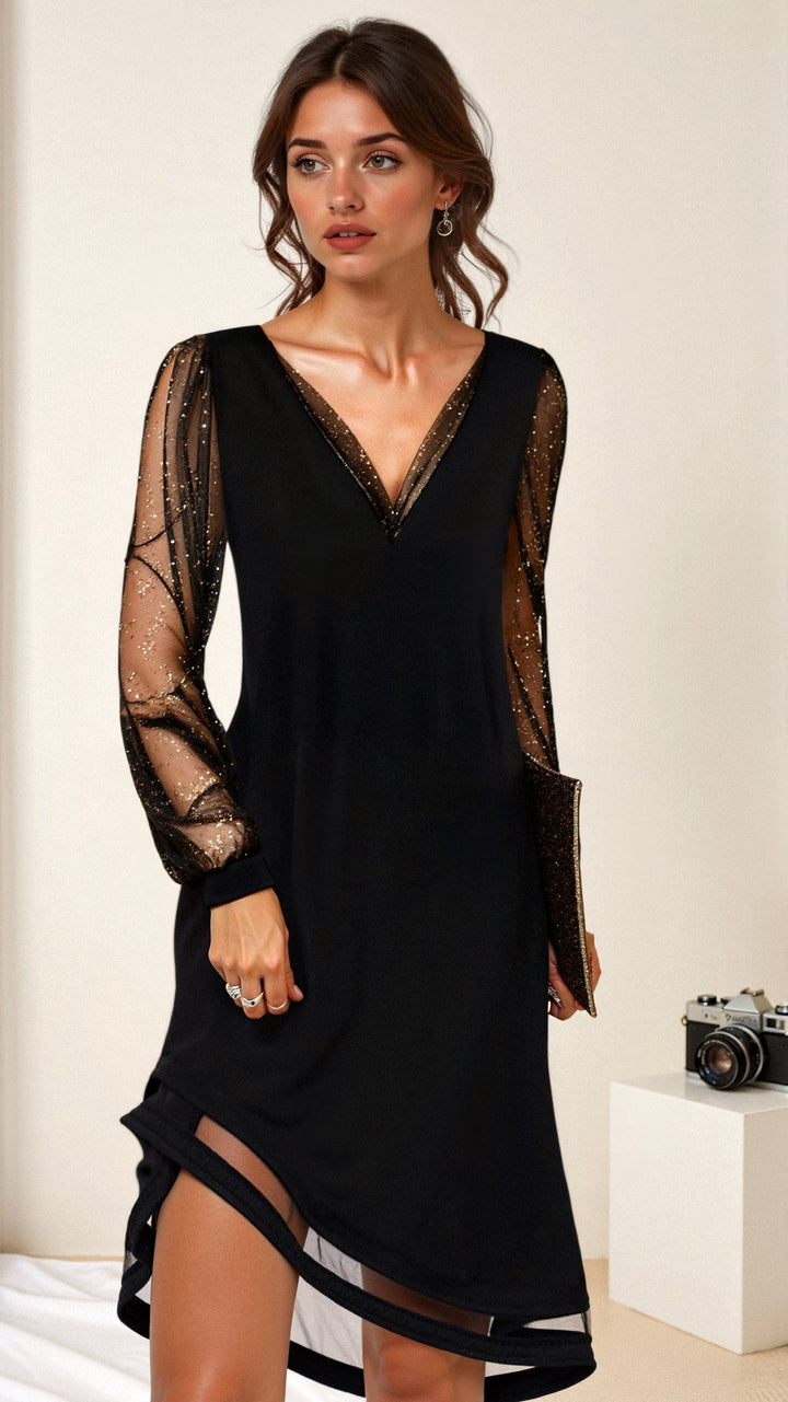 Black V-neck dress with sheer polka dot mesh sleeves, worn by model | Grace Aura