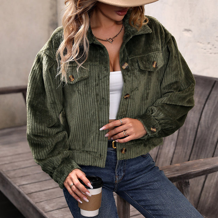 Green corduroy button-front jacket worn by woman, paired with denim jeans | Grace Aura
