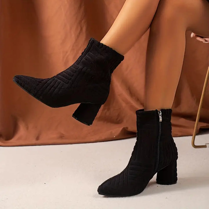 Black textured chunky heel ankle boots with side zipper, worn by model | Grace Aura