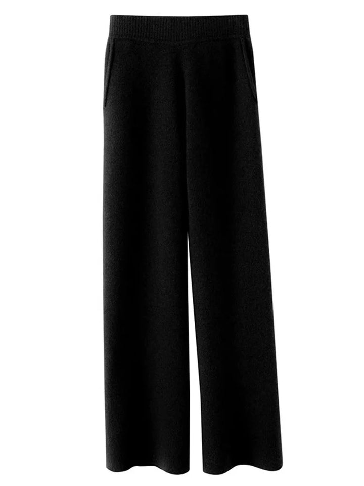 Black knitted wide-leg pants with elastic waist, shown flat, ribbed waistband | Grace Aura