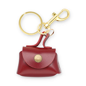 Red leather mini purse charm keychain with gold clasp and hardware | Grace Aura