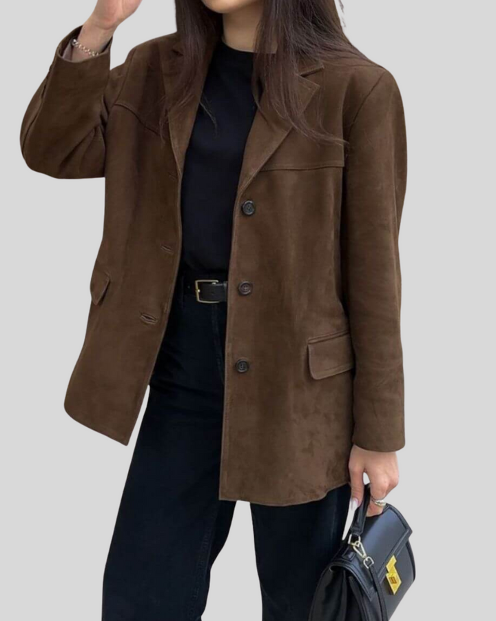Brown suede oversized blazer worn by woman with black outfit | Grace Aura