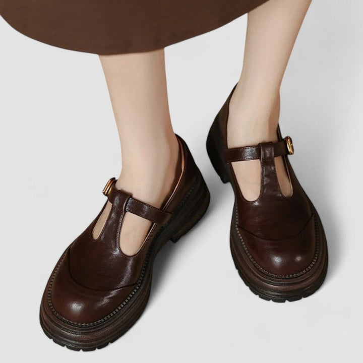 Brown leather T-bar Mary Jane shoes worn by a person, chunky sole | Grace Aura