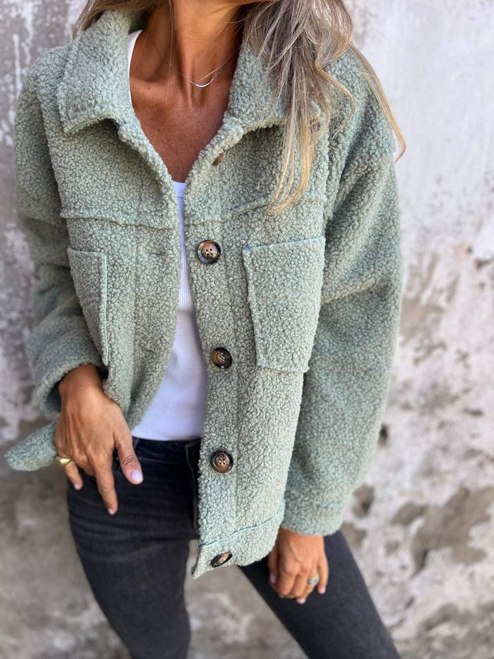 Sage green teddy fleece jacket with button closure, worn by woman | Grace Aura