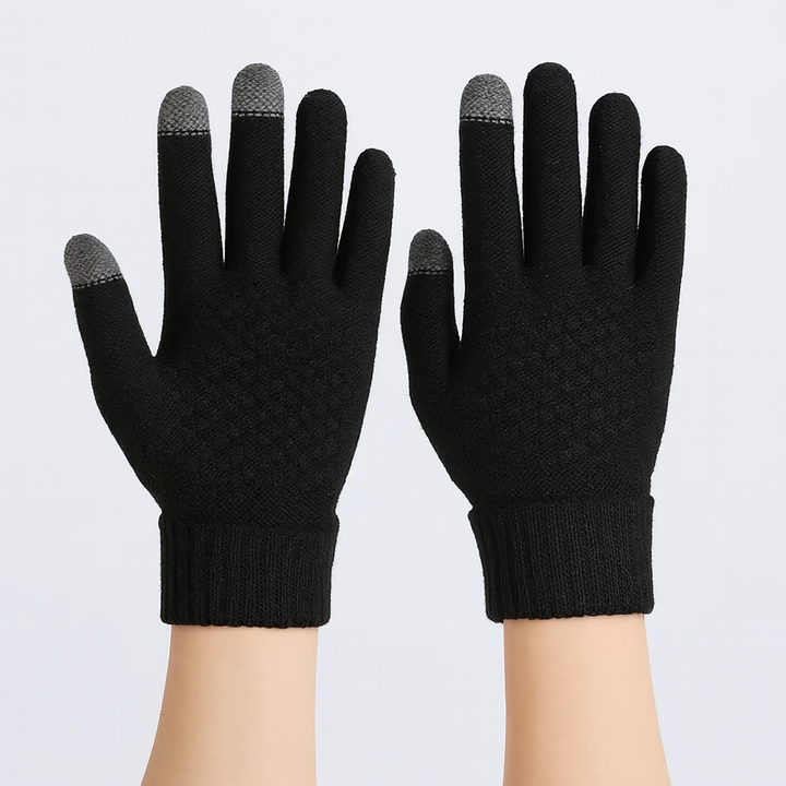 Black knitted touchscreen gloves with gray fingertips, worn on hands | Grace Aura