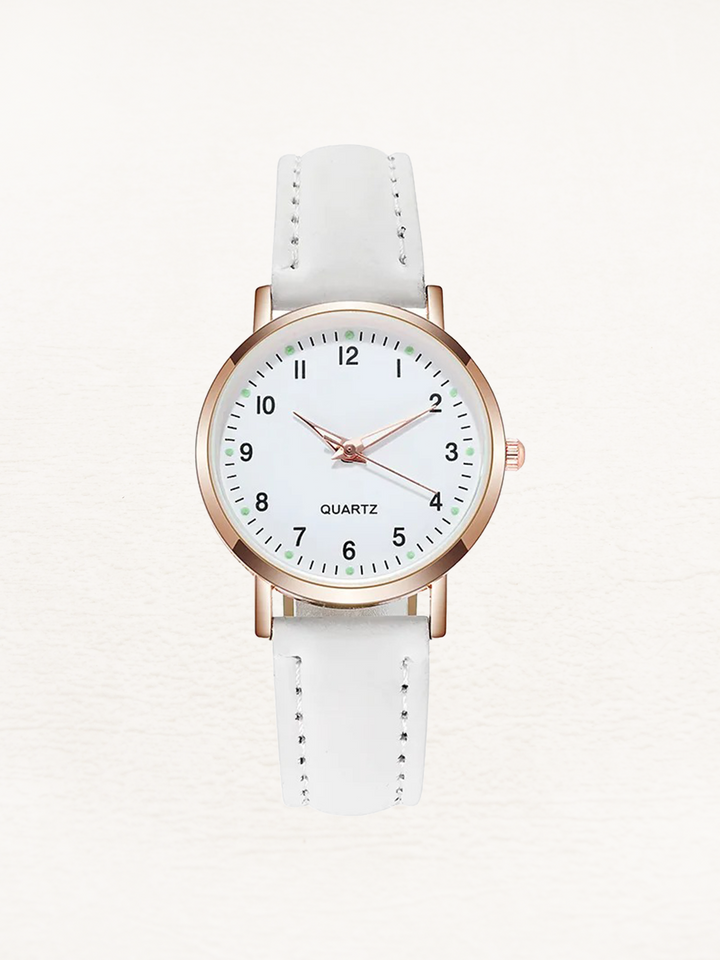 White faux leather strap watch with rose gold round case, flat lay | Grace Aura