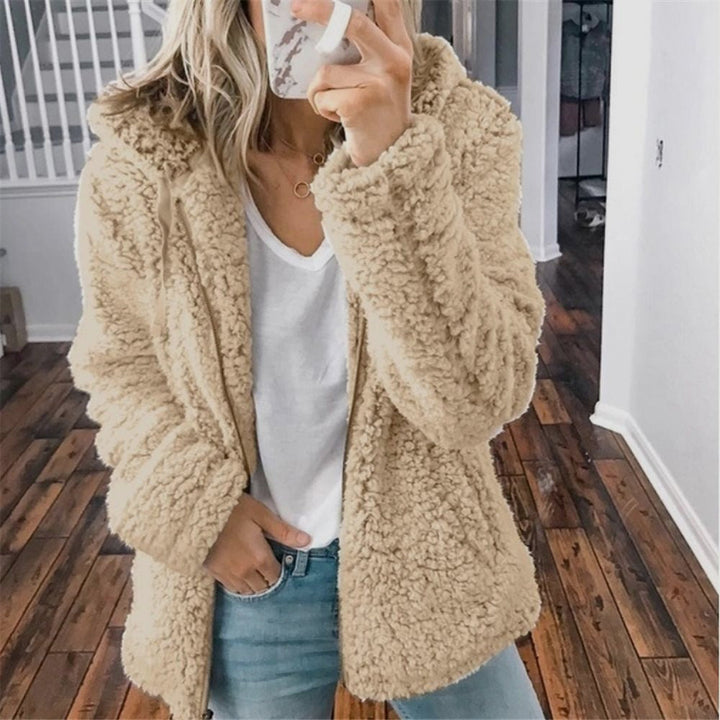 Beige teddy fleece hooded jacket worn by woman with jeans | Grace Aura