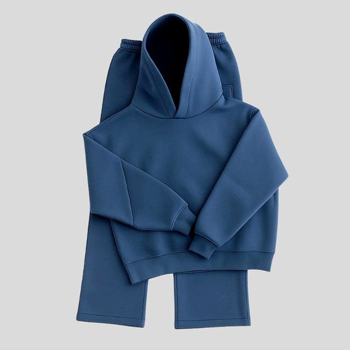 Navy blue hoodie tracksuit with joggers, shown flat on gray background | Grace Aura