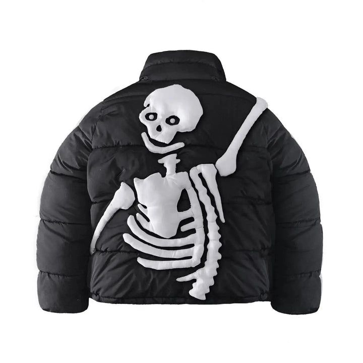 Black puffer jacket with white raised skeleton design, back view, flat lay | Grace Aura