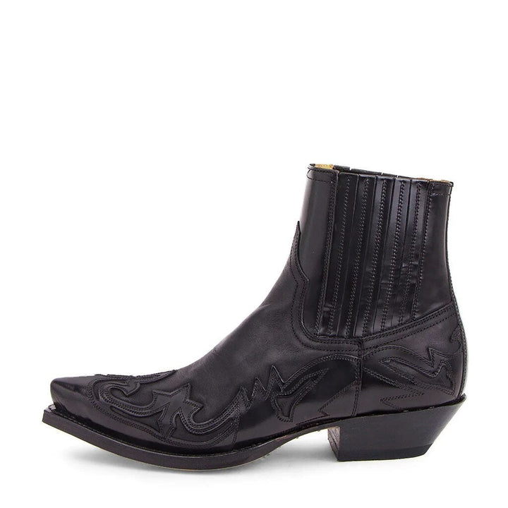 Black ankle boot with pointed toe, flame stitching, elastic side panel | Grace Aura