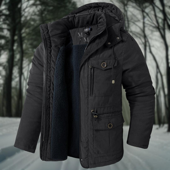 Black quilted hooded parka with fleece lining, displayed open on hanger | Grace Aura