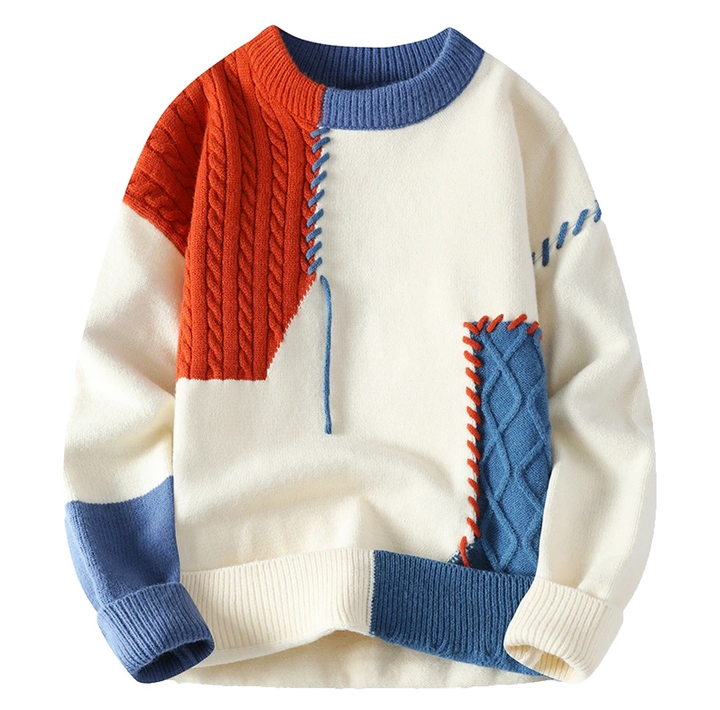 Cream patchwork sweater with orange cable knit and blue contrast trim, flat | Grace Aura