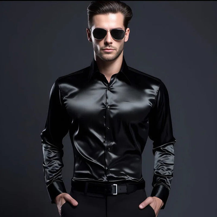 Man wearing black satin long sleeve shirt with sunglasses and belt | Grace Aura