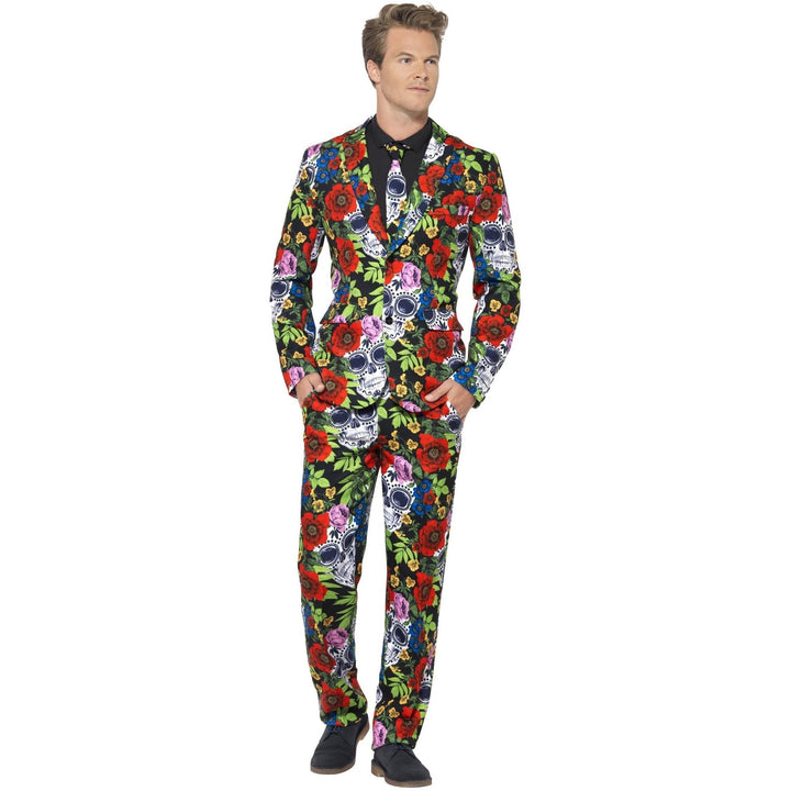 Man wearing colorful floral and sugar skull print suit jacket and trousers | Grace Aura