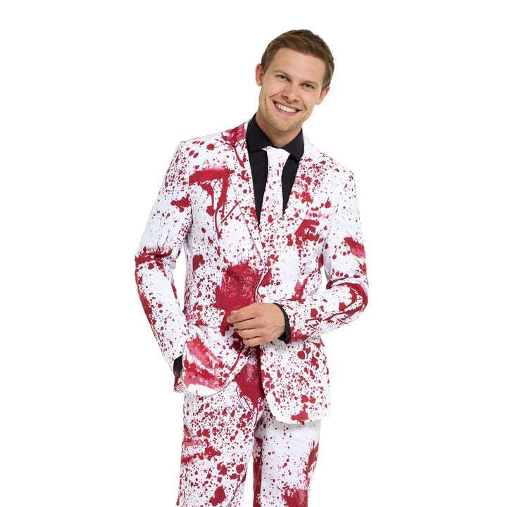 Man wearing white suit jacket and trousers with red blood splatter pattern | Grace Aura