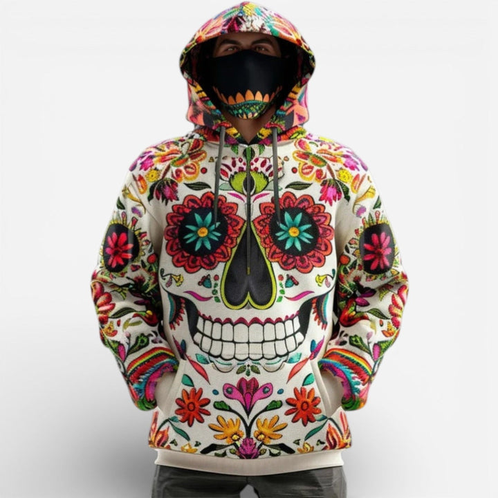 Colorful sugar skull print hoodie worn by man with black face mask | Grace Aura