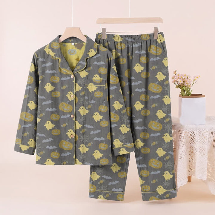 Gray pyjama set with yellow ghost and pumpkin print, hanging display | Grace Aura