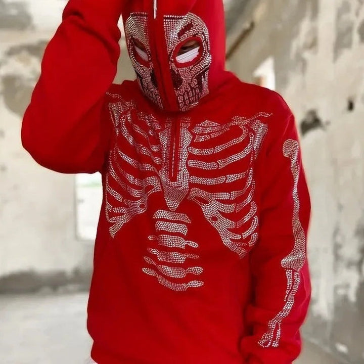 Red hoodie with rhinestone skeleton design and skull mask hood, worn by person | Grace Aura