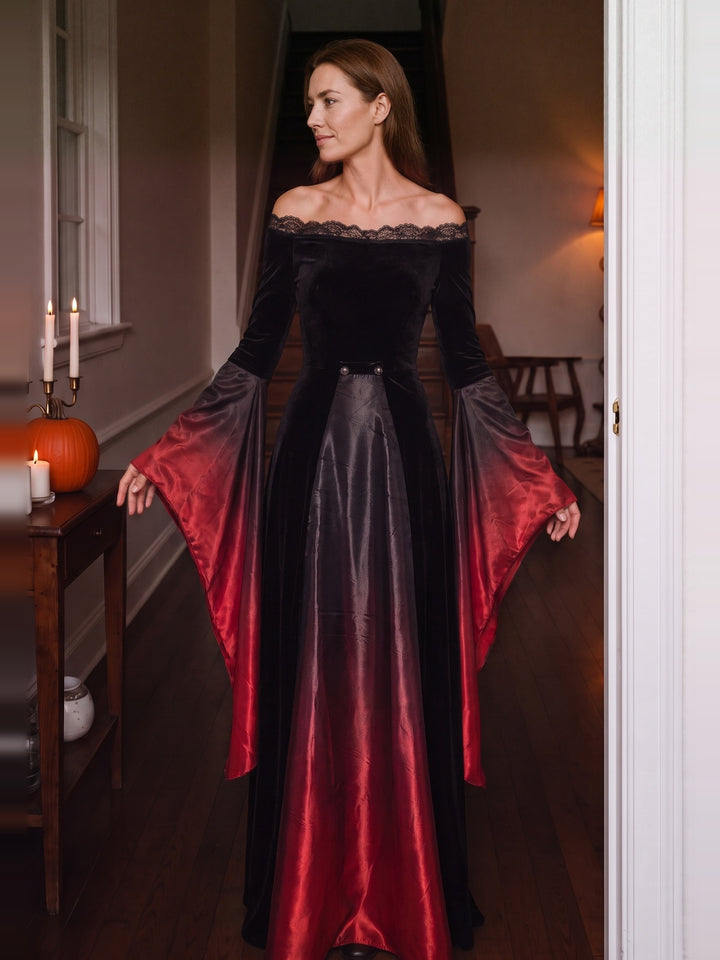 Woman in a long black and red vampire queen dress