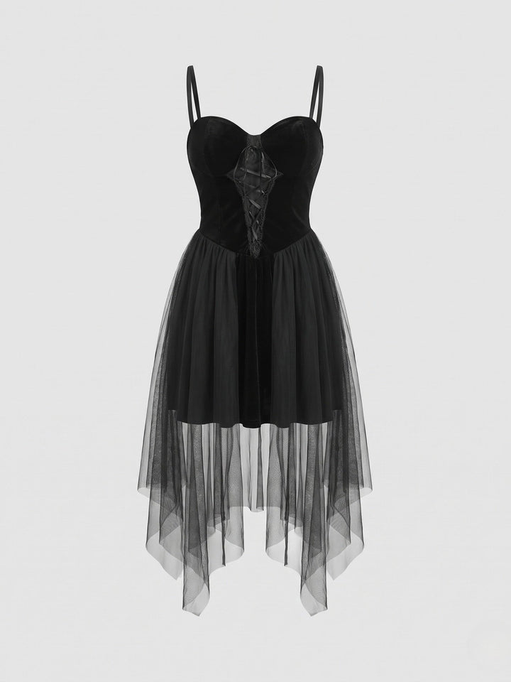 Black velvet corset dress with tulle skirt laid flat