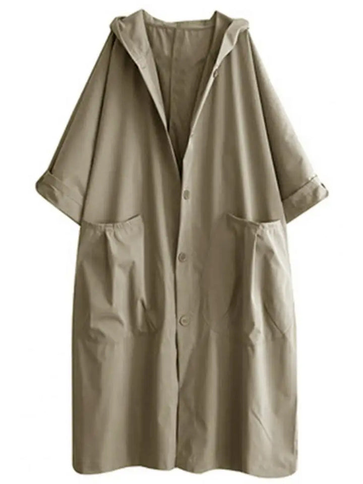 Khaki hooded long coat with front buttons and large pockets, worn flat | Grace Aura