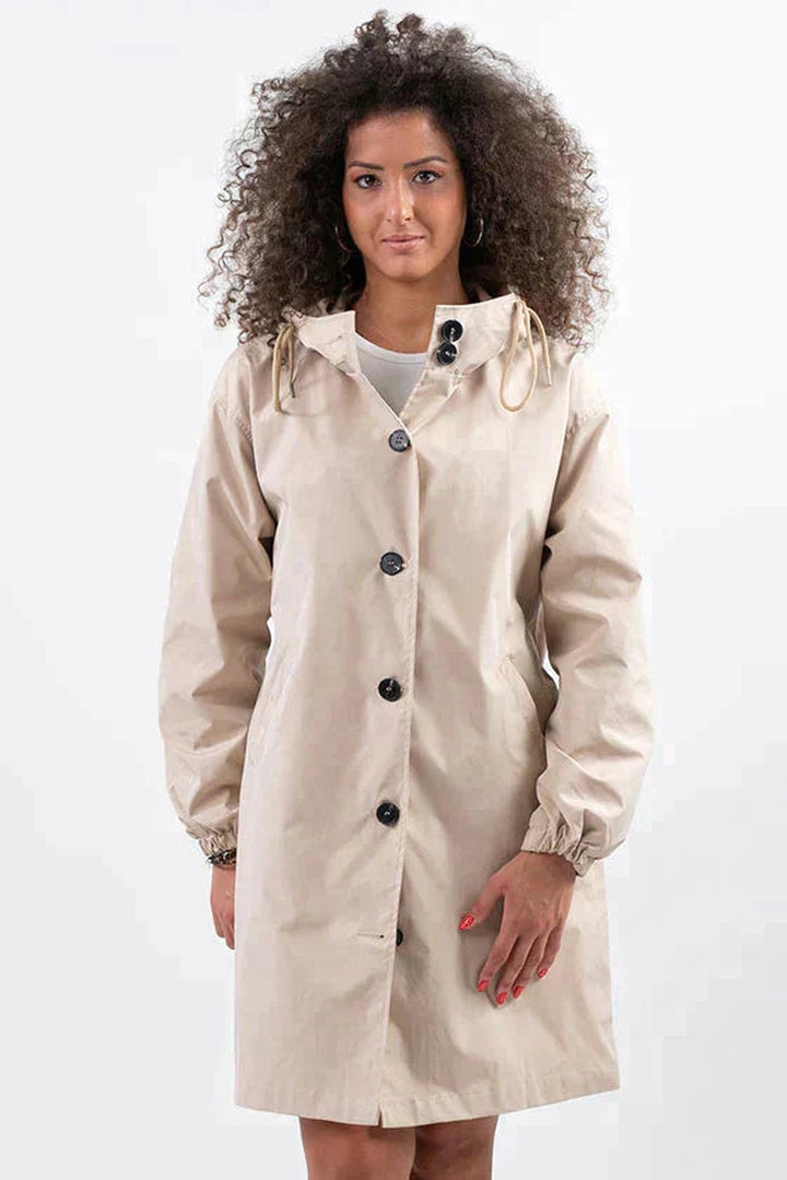 Beige hooded raincoat with a button front, front view