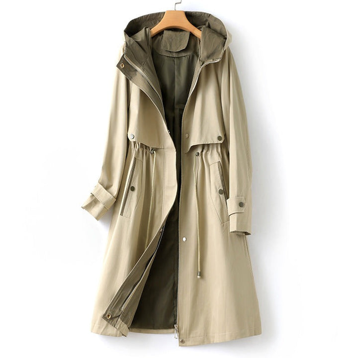 Beige hooded trench coat with drawstring waist and olive inner facing, on a hanger