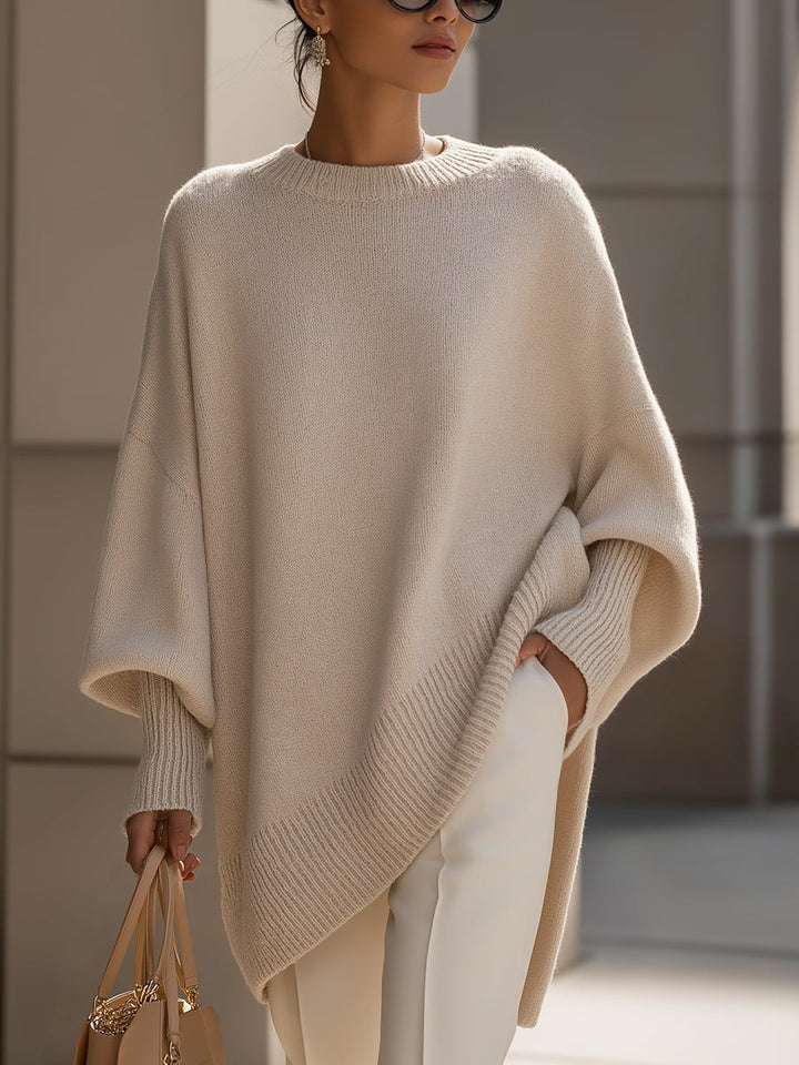 Beige longline oversized jumper with batwing sleeves, front view