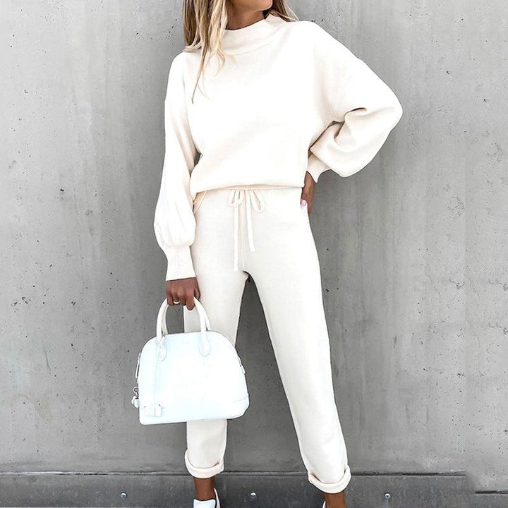 Cream knitted loungewear set with high neck worn by model outdoors | Grace Aura