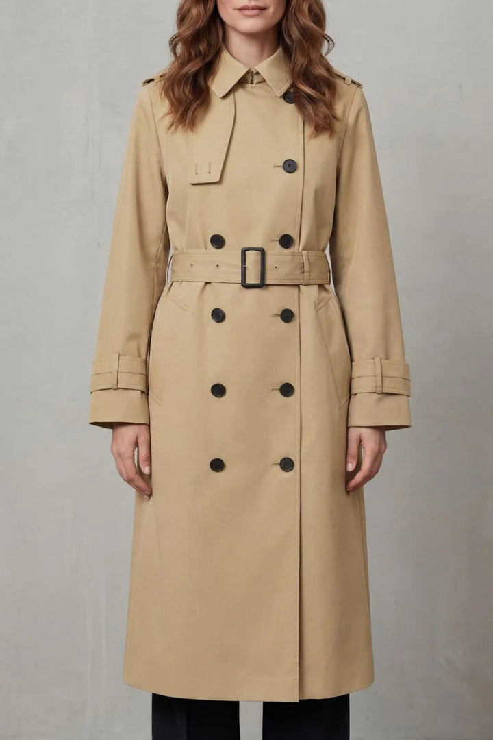 Beige double-breasted trench coat for women with a buckled belt, front view