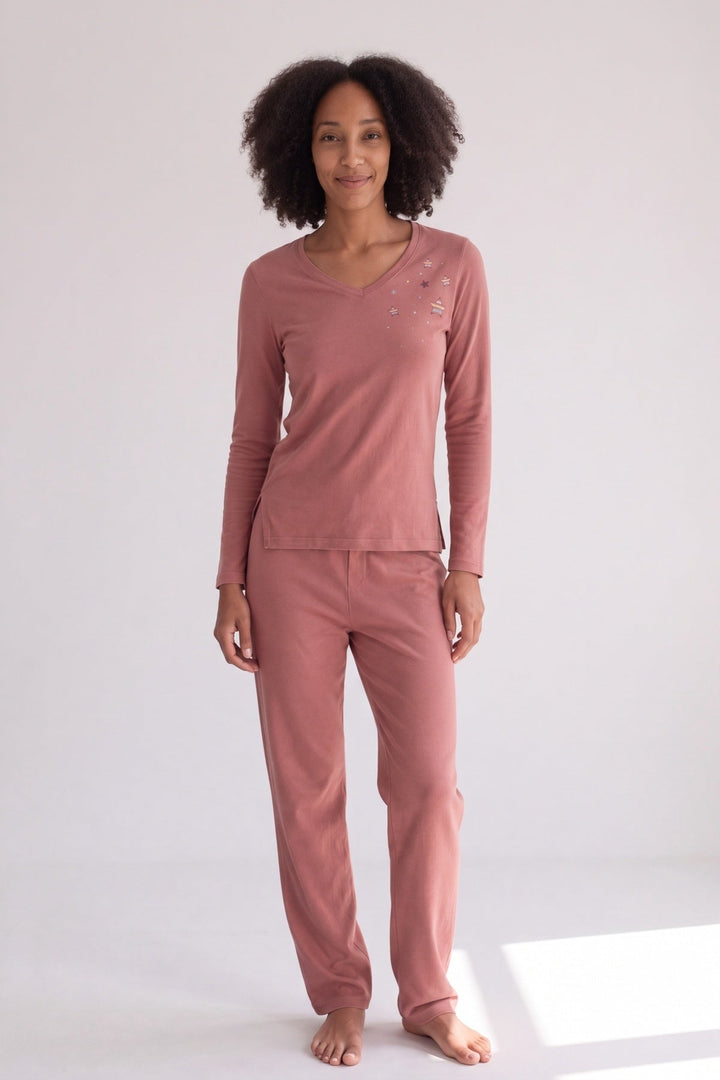 Clay rose long-sleeved cotton pyjamas with star print, worn, front view