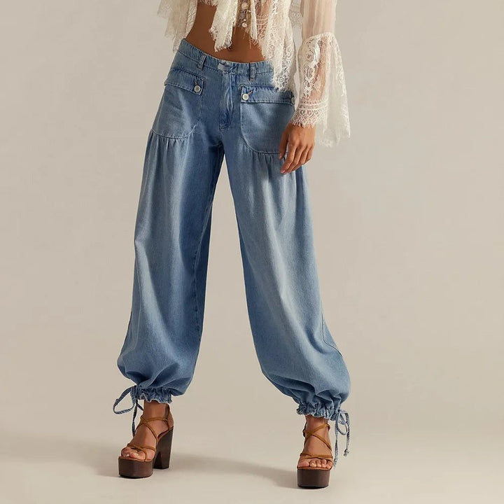Light blue wide leg jeans with gathered front and ankle ties
