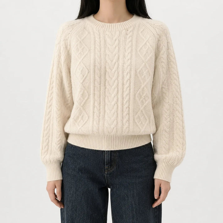 Cable-knit jumper in cream, worn, front view